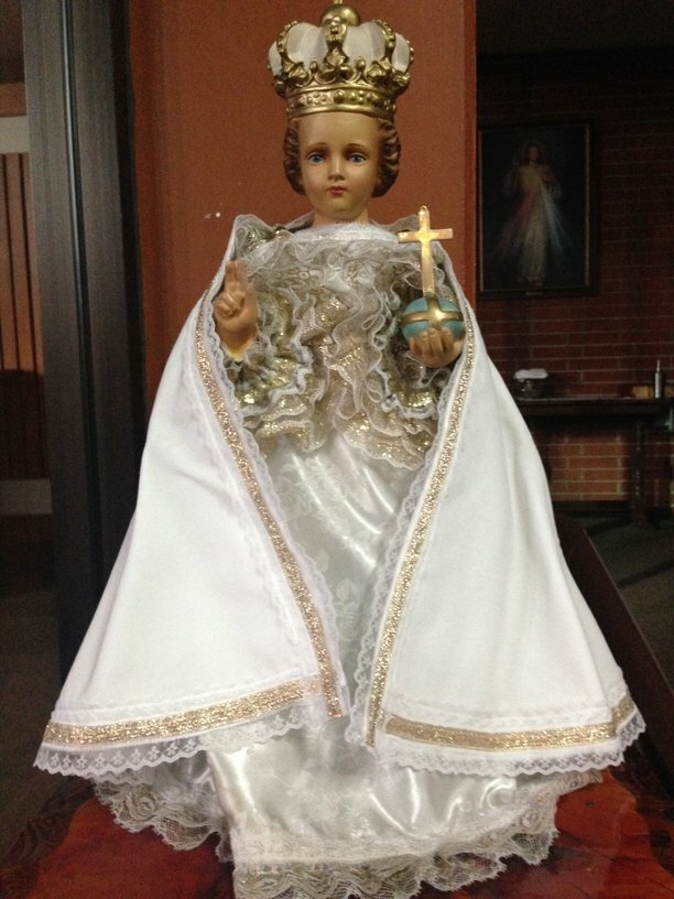 Infant Jesus dressed in royal robes